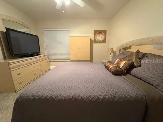 a bathroom with a shower and a sink