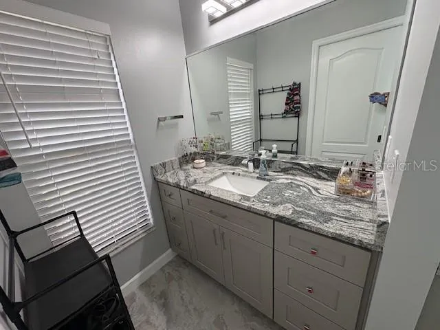 a living room with furniture or kitchen and a couch