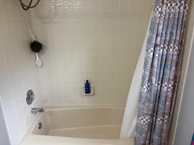 a front view of a house with large windows