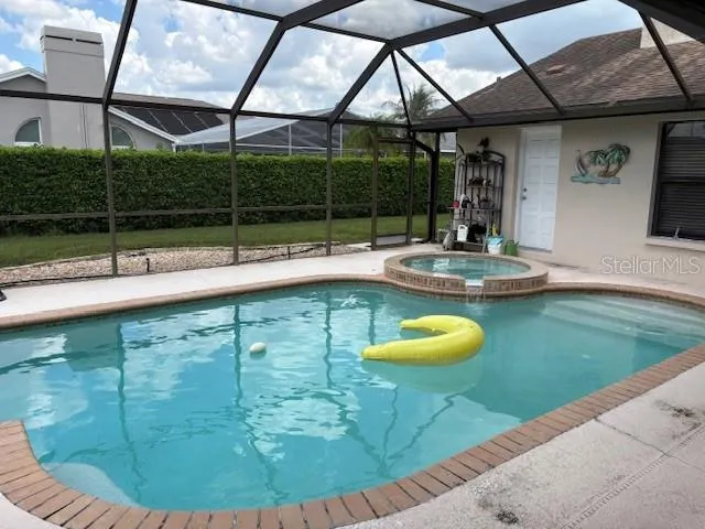 a kitchen with stainless steel appliances granite countertop a stove microwave and cabinets
