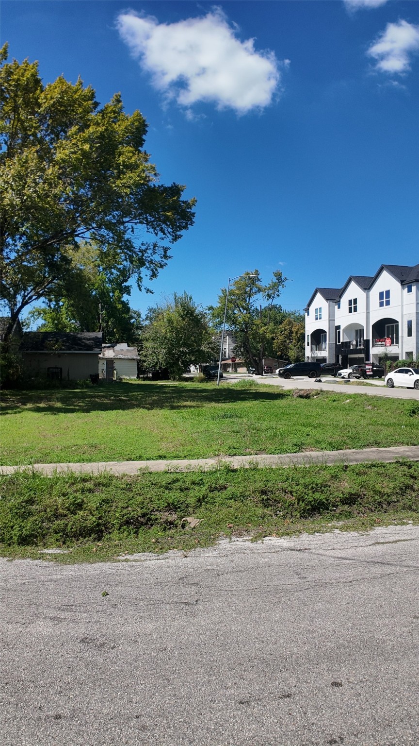 6802 England Street Houston, TX 77021 - Photo 2 of 8 a front view of a house with a yard