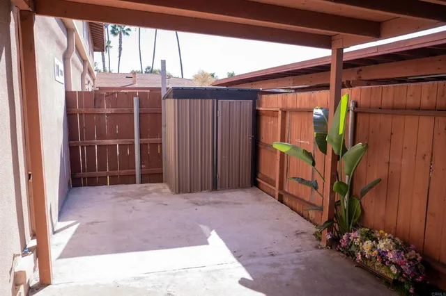 a view of a house with a potted plant