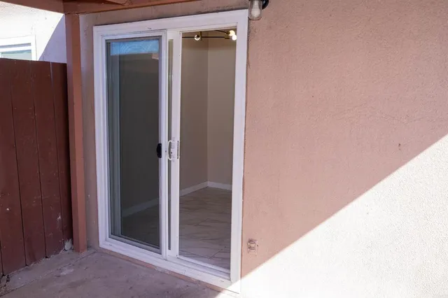 an aerial view of a house with outdoor space