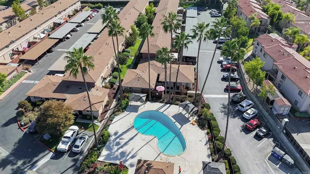 an aerial view of a house with a garden