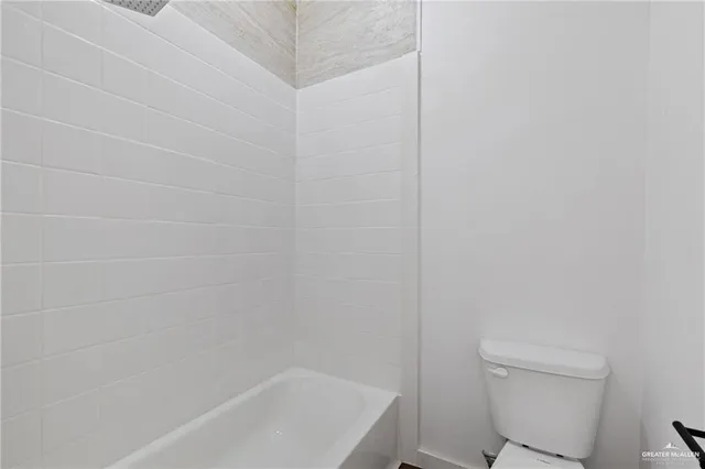 a close up of a bathtub in a bathroom