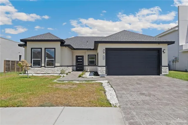 a view of a house with swimming pool and a table and chairs