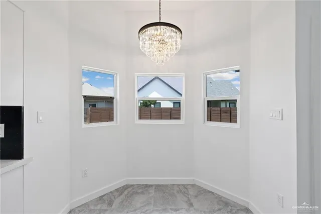 a view of a livingroom with windows