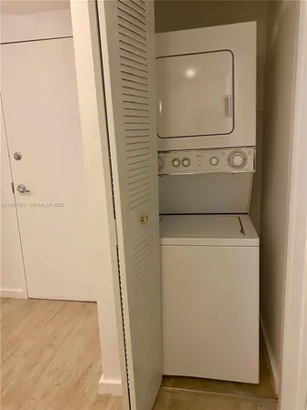 a front view of a house with parking space