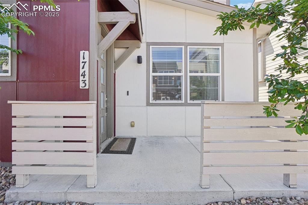 1743 Spring Water Point Colorado Springs, CO 80908 - Photo 3 of 35 a view of a house with a window
