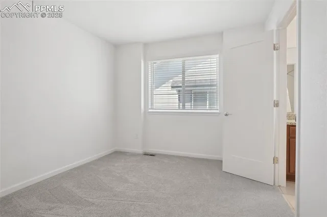 a view of a room with an empty space