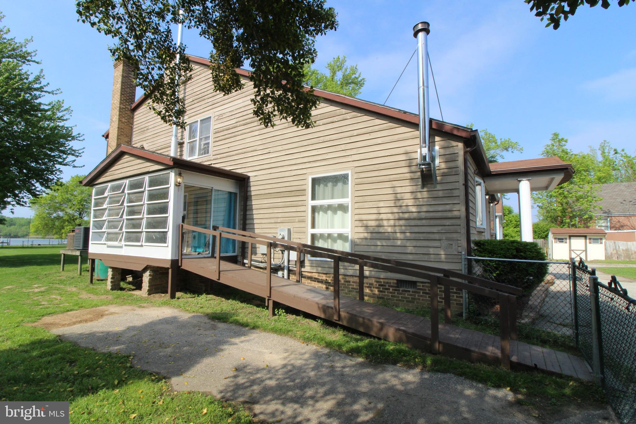 4018 Briar Point Road Baltimore, MD 21220 - Photo 33 of 56 Side view of home with screened in porch.