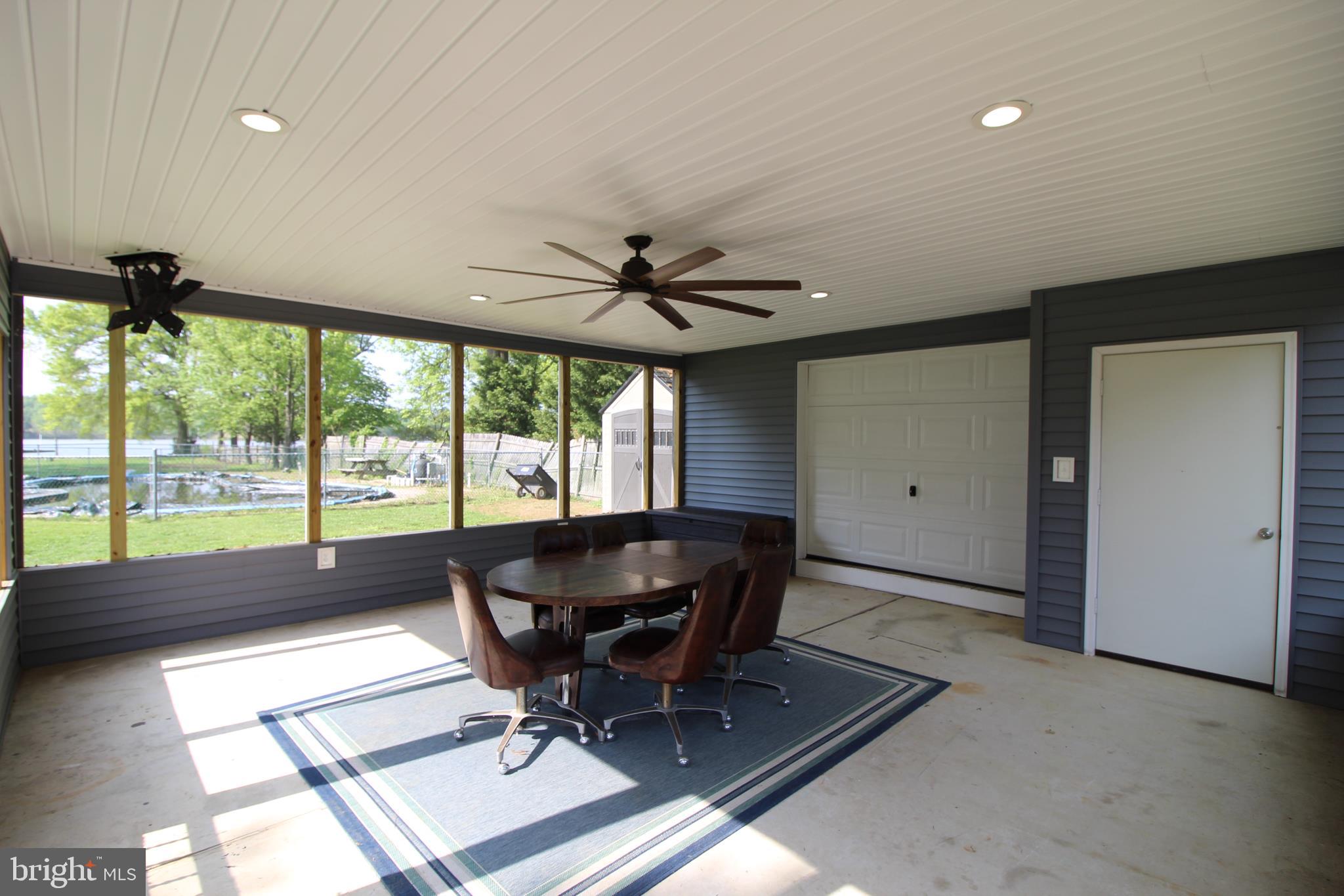 4018 Briar Point Road Baltimore, MD 21220 - Photo 45 of 56 Interior of screened Crab House with workshop
