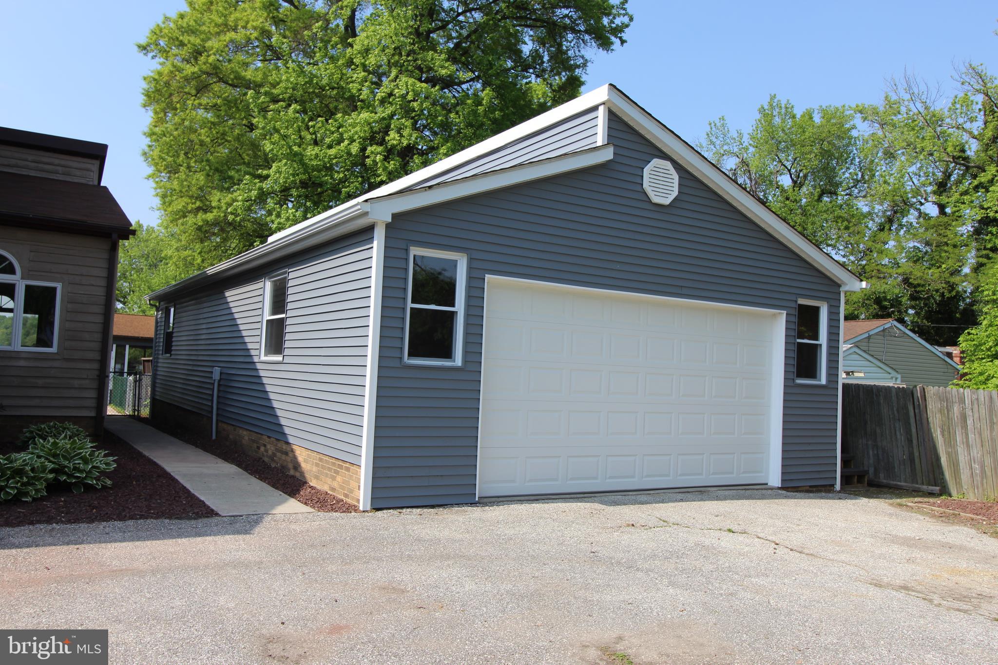4018 Briar Point Road Baltimore, MD 21220 - Photo 6 of 56 New electric, 2 car spacing & workshop inside.