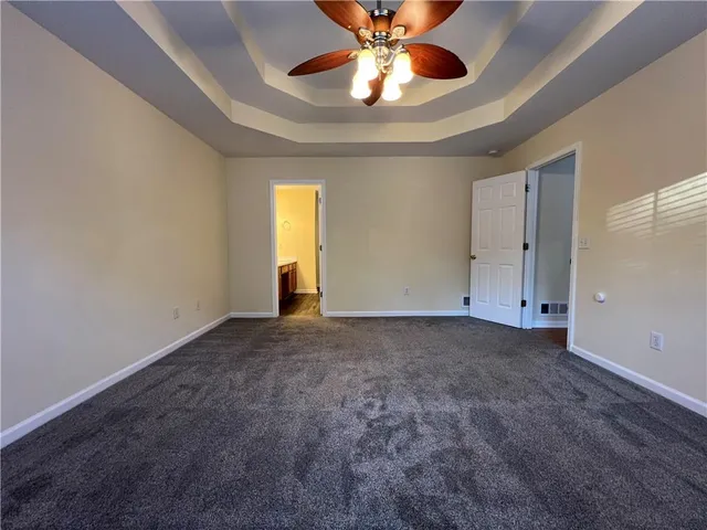 a view of an empty room and window