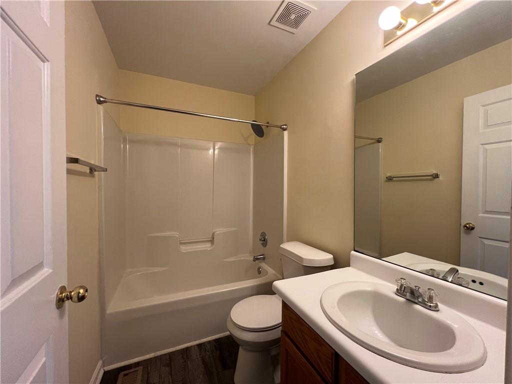 2705 Waymar Drive Southwest Marietta, GA 30008 - Photo 18 of 28 a bathroom with a sink toilet and shower