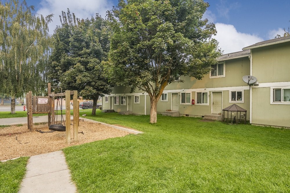 800 South County Road Warden, WA 98857 - Photo 7 of 10 a front view of a house with a garden