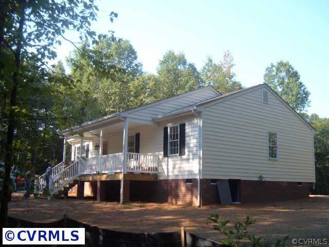 a front view of house with street