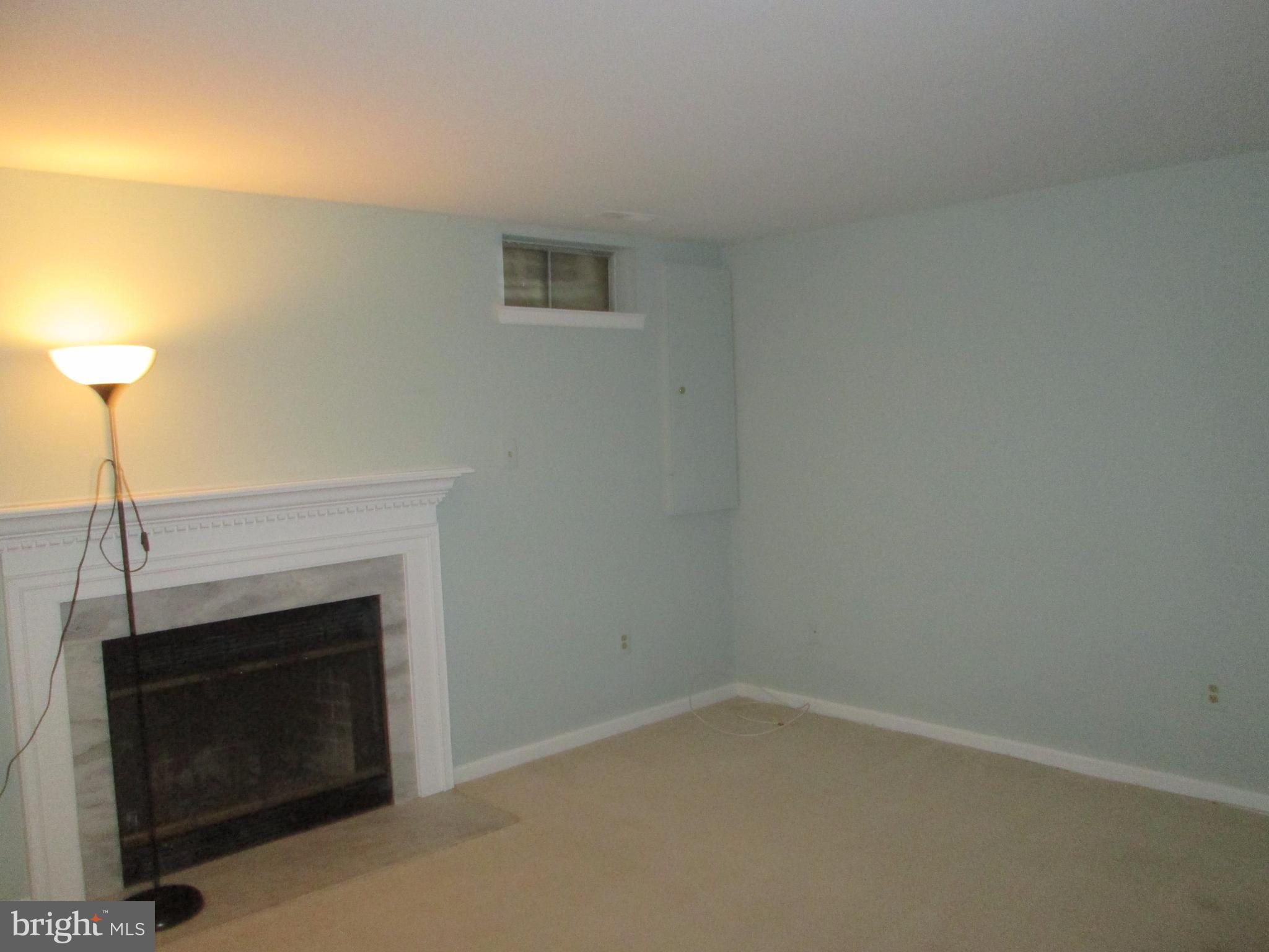2201 Wimbledon Circle Silver Spring, MD 20906 - Photo 13 of 28 Family Room with window.