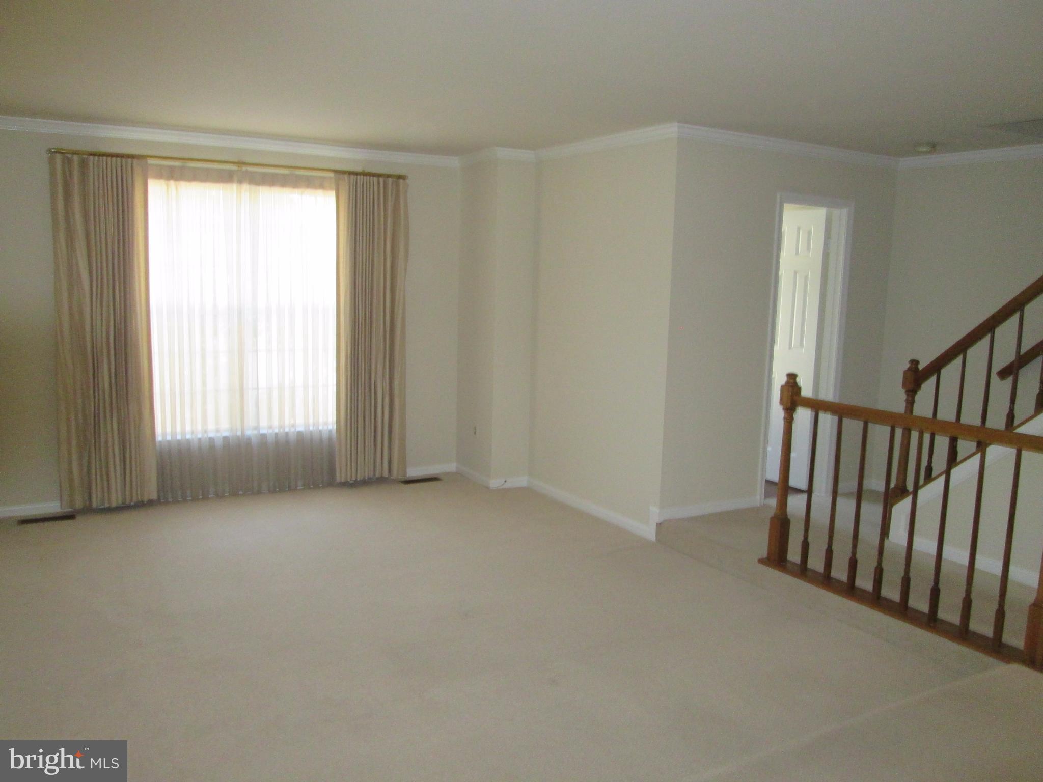 2201 Wimbledon Circle Silver Spring, MD 20906 - Photo 6 of 28 There is a powder room off of living room