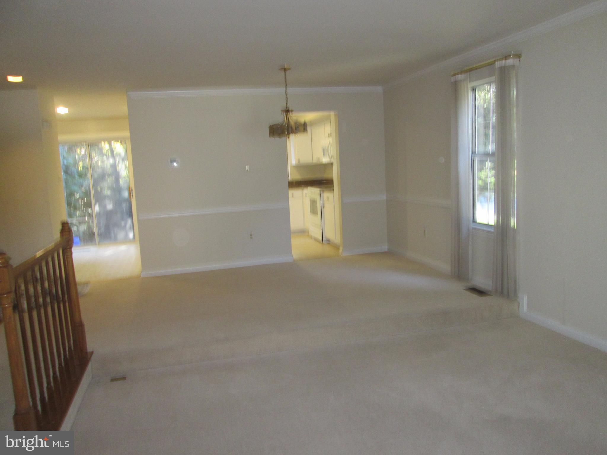 2201 Wimbledon Circle Silver Spring, MD 20906 - Photo 7 of 28 Dining room leading to kitchen
