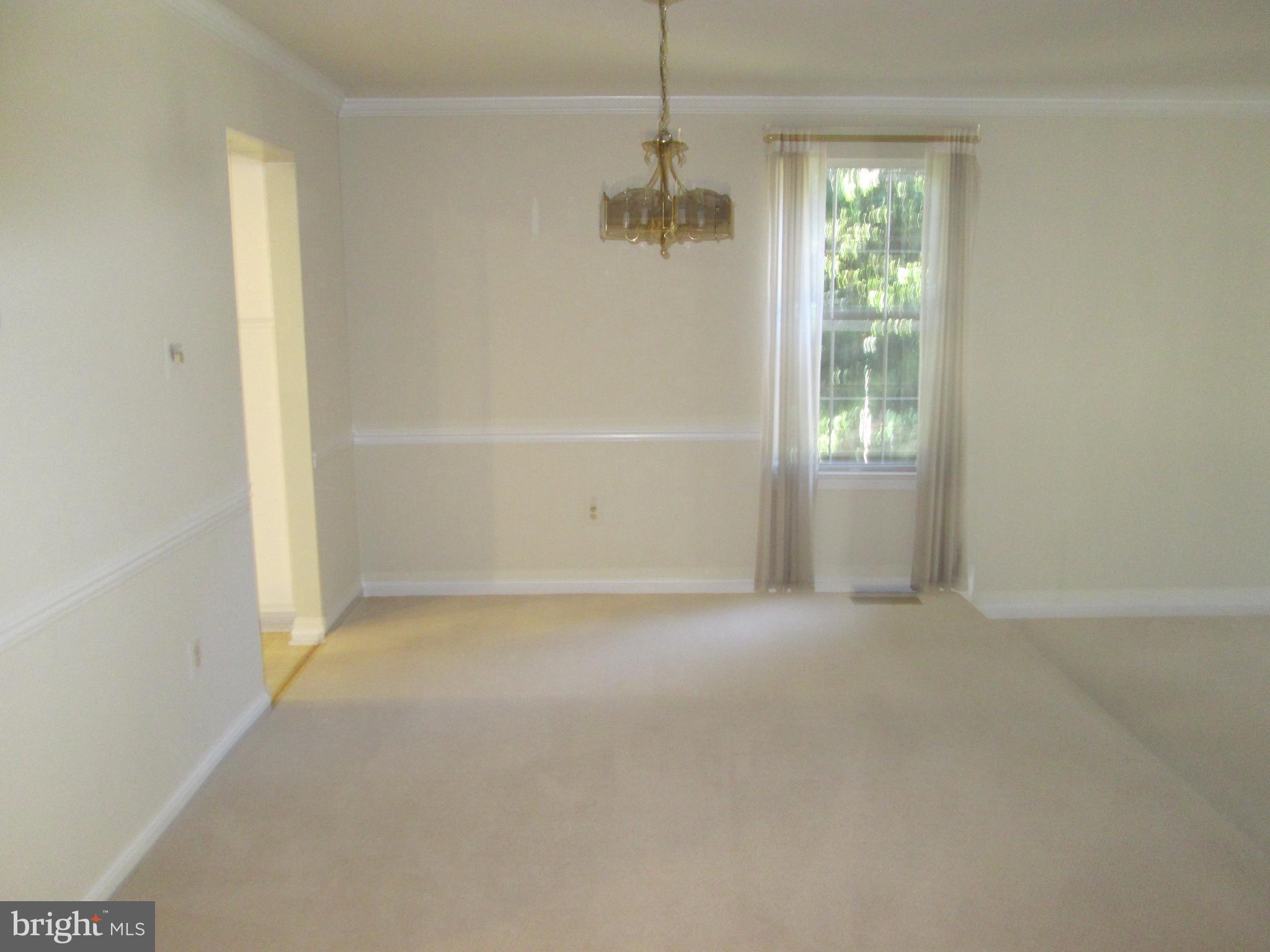 2201 Wimbledon Circle Silver Spring, MD 20906 - Photo 8 of 28 Dining room with side window