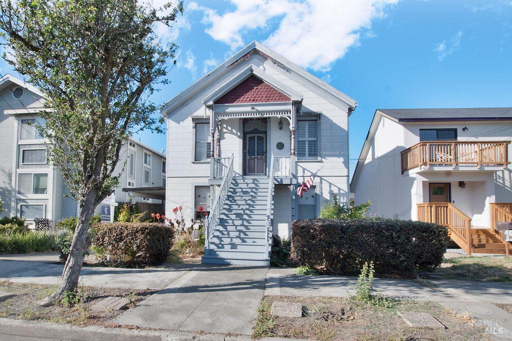 141 East F Street Benicia, CA 94510 - Photo 1 of 1 a front view of a house with garden