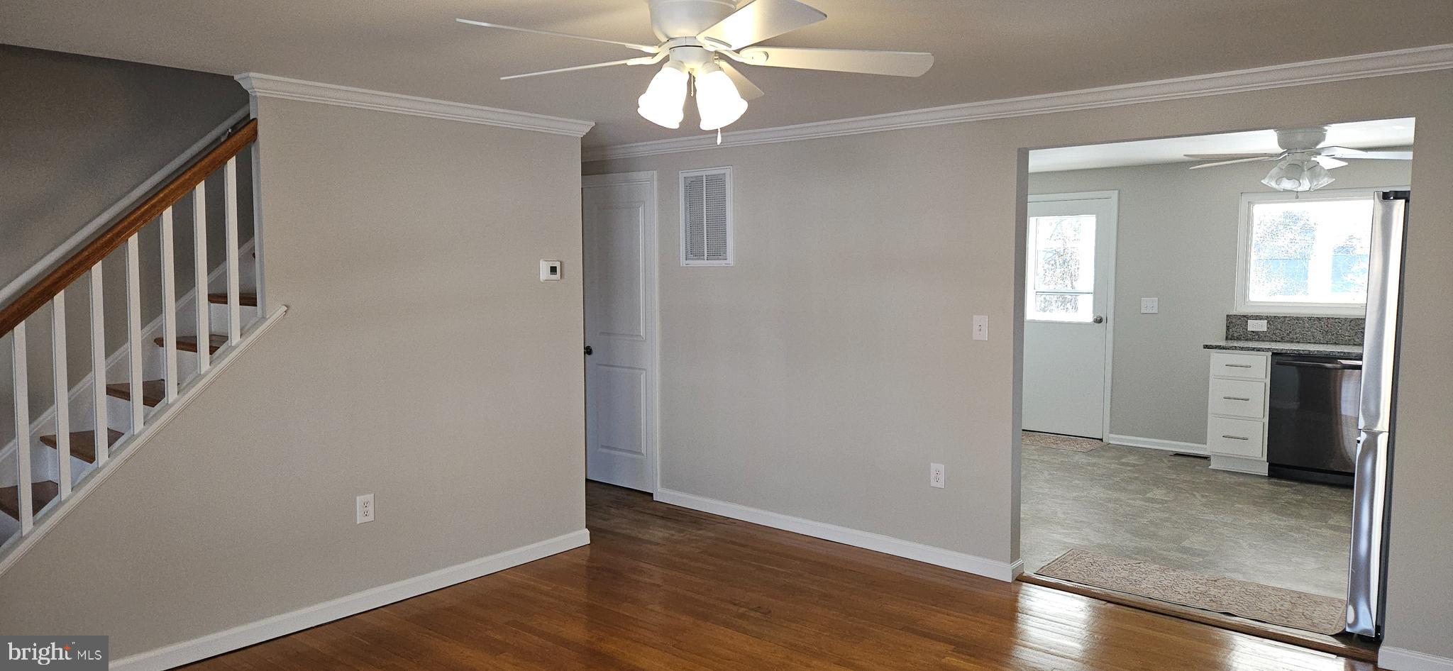 232 Myrtle Avenue Winchester, VA 22601 - Photo 14 of 36 wooden floor in an empty room with a window