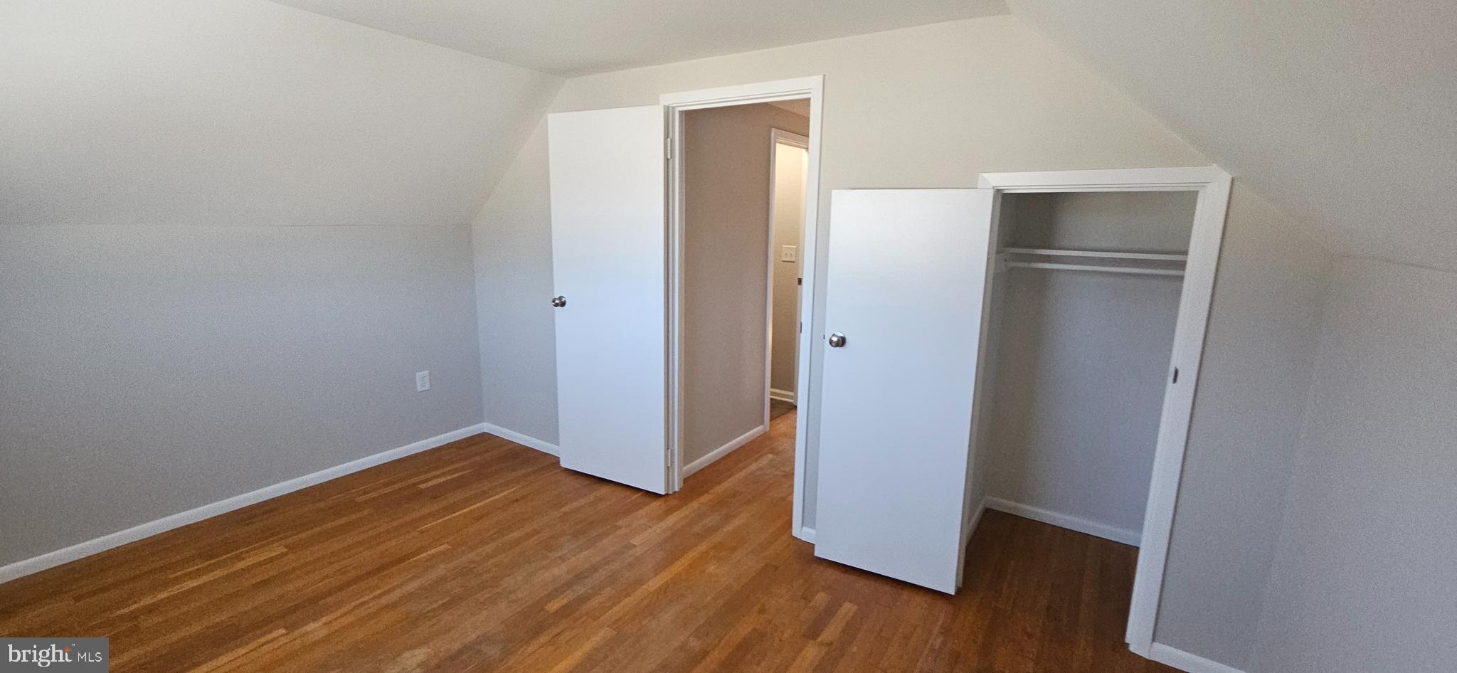 232 Myrtle Avenue Winchester, VA 22601 - Photo 16 of 36 an empty room with wooden floor and closet