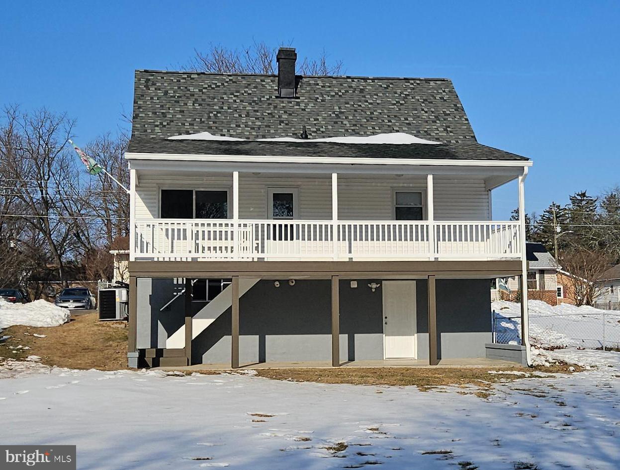 232 Myrtle Avenue Winchester, VA 22601 - Photo 2 of 36 a front view of a house with a yard
