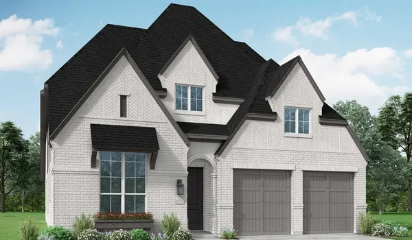a front view of a house with many windows