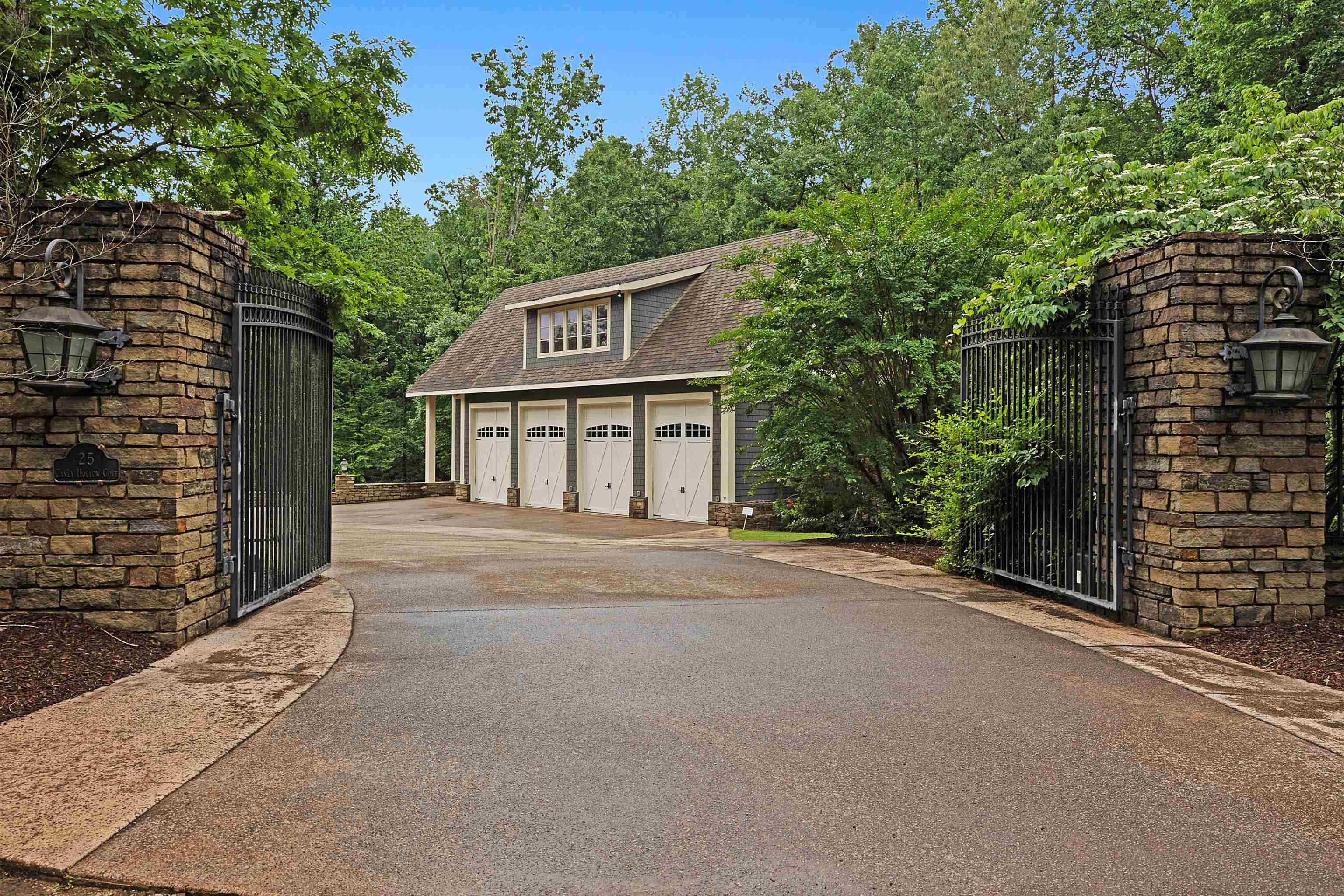 25 Caney Hollow Road Counce, TN 38326 - Photo 37 of 40 Garage with a gate, a detached garage, and driveway