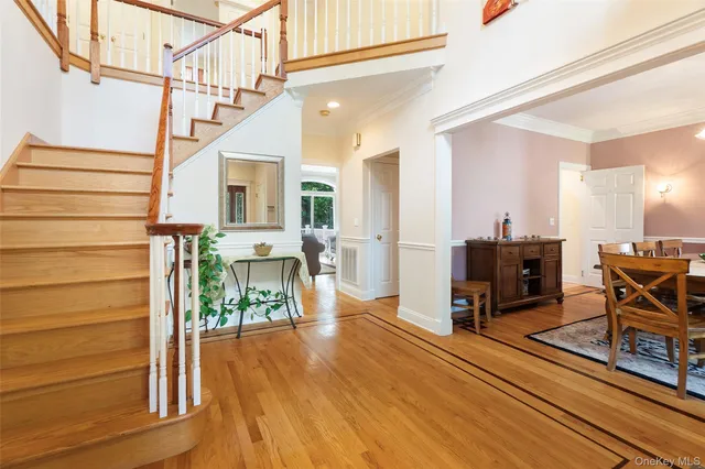 a view of a livingroom with furniture and a flat screen tv