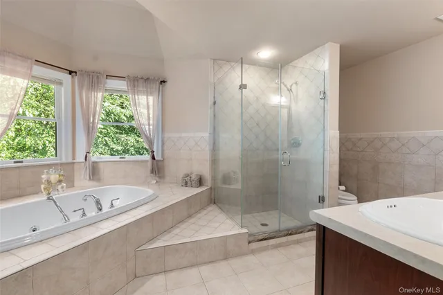 a bathroom with a bathtub and a sink