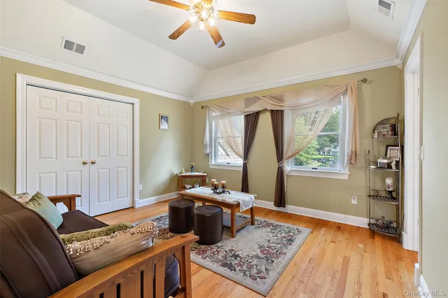a living room with furniture and a window