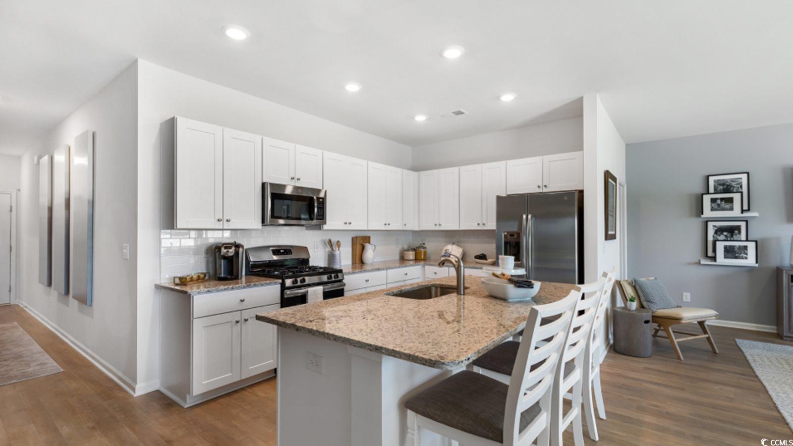 1167 Silver Perch Place Sunset Beach, NC 28468 - Photo 2 of 14 Kitchen featuring stainless steel appliances, wood