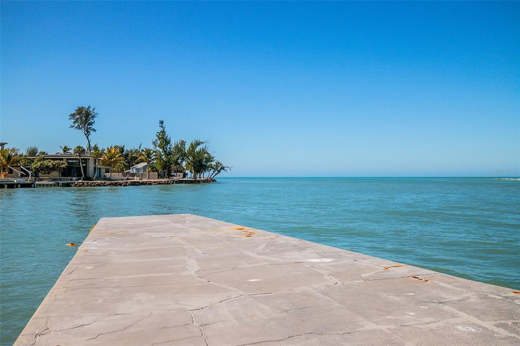 208 Pass Key Road, Unit 208 Sarasota, FL 34242 - Photo 24 of 29 a view of a lake