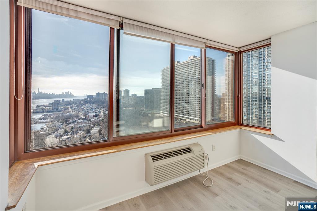 100 Old Palisade Road, Unit 2709 Fort Lee, NJ 07024 - Photo 4 of 15 a view of a living room with a large window
