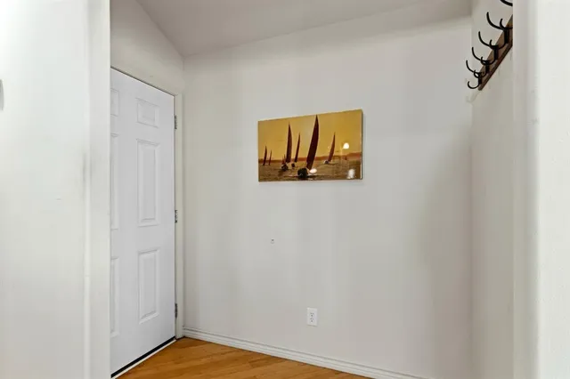 a view of a livingroom with wooden floor