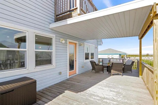 a balcony with furniture and outdoor space