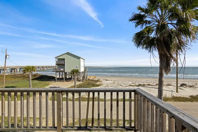 a balcony with an ocean view