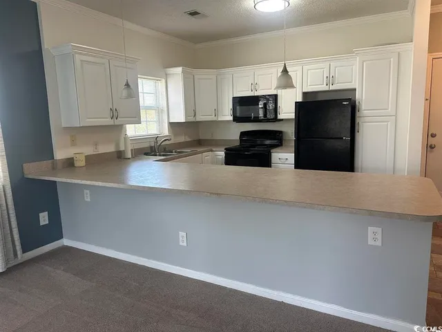 $1,450 | 3927 Gladiola Court, Unit 204, Myrtle Beach, SC 29588