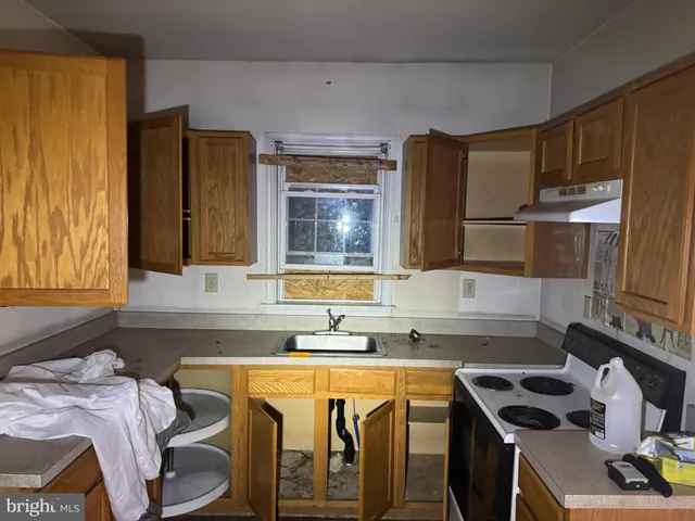 a bathroom with sink and mirror