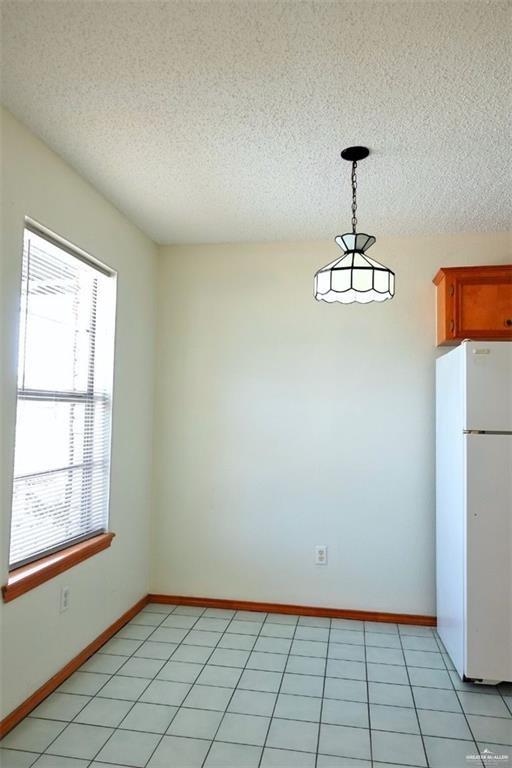 3401 North Inspiration Road, Unit 1 Mission, TX 78573 - Photo 5 of 9 a view of an empty room with a window