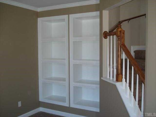 Formal Living Room open to the Stunning Foyer (could also be an office w/ built-ins)