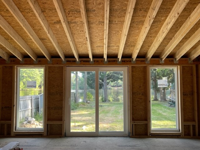 65 Isle Of Capri Road Coventry, RI 02816 - Photo 8 of 15 INTERIOR/REAR YARD VIEW OF POND