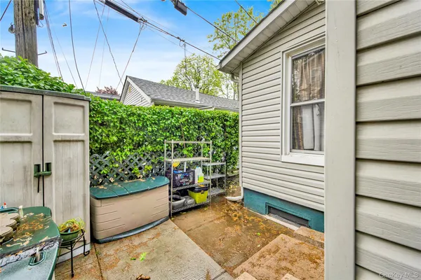 a view of a porch with a bench