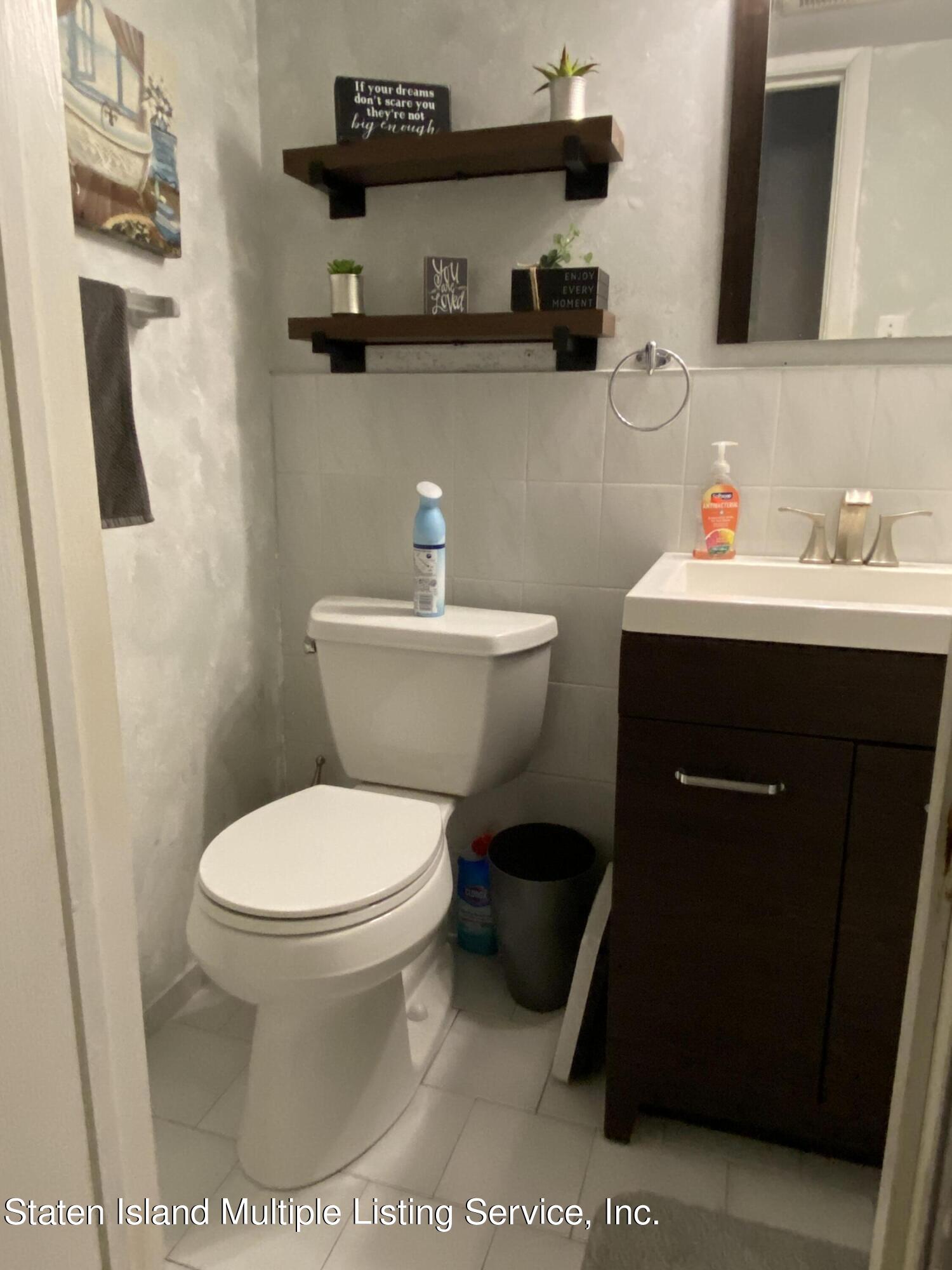 171 Lorraine Loop Staten Island, NY 10309 - Photo 17 of 24 Half bathroom (basement)