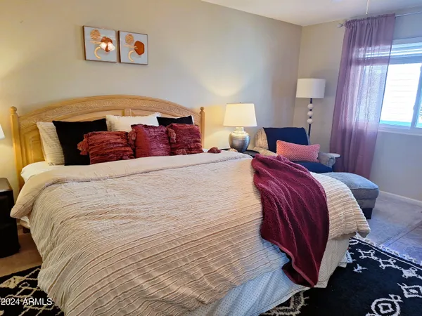 a view of kitchen with a dining table chairs and entryway