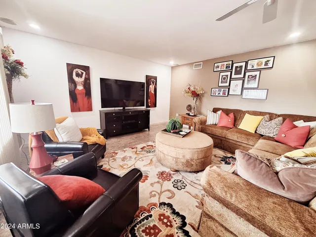 a living room with furniture and a couch