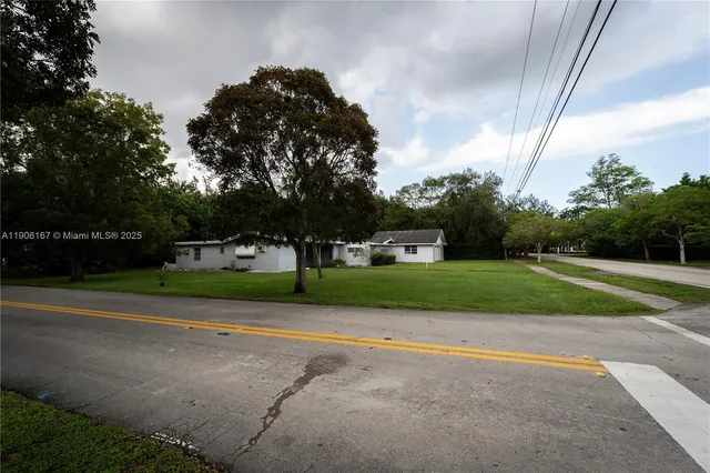 a view of road and trees